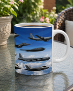 A coffee mug with a printed image of fighter jets flying in formation against a blue sky with clouds.