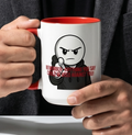 A person is holding a white mug with a red rim, which features a cartoon character and the text "REEMEMBER - anything you say, could be used against you!"