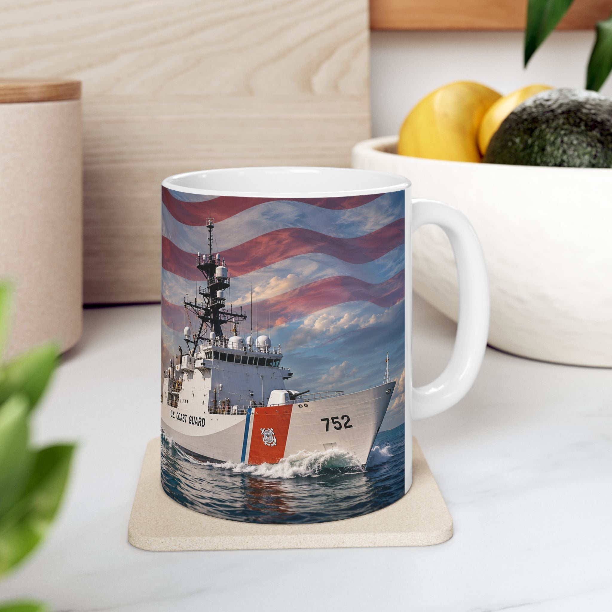 A mug featuring a photograph of a Coast Guard ship sailing on the ocean, with the text "US Coast Guard" and the number "752" printed on it.