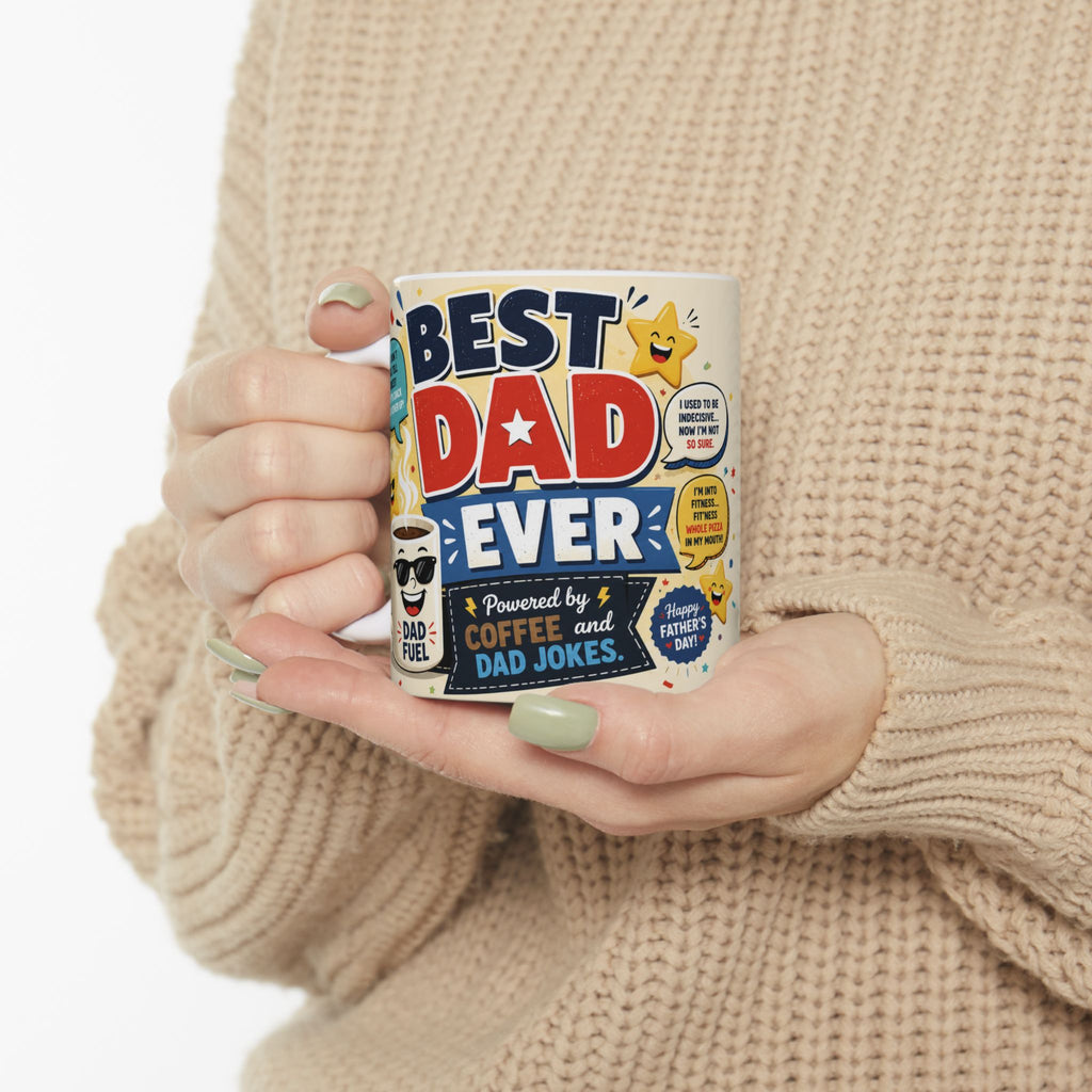 A person is holding a mug with the text "BEST DAD EVER" printed on it.