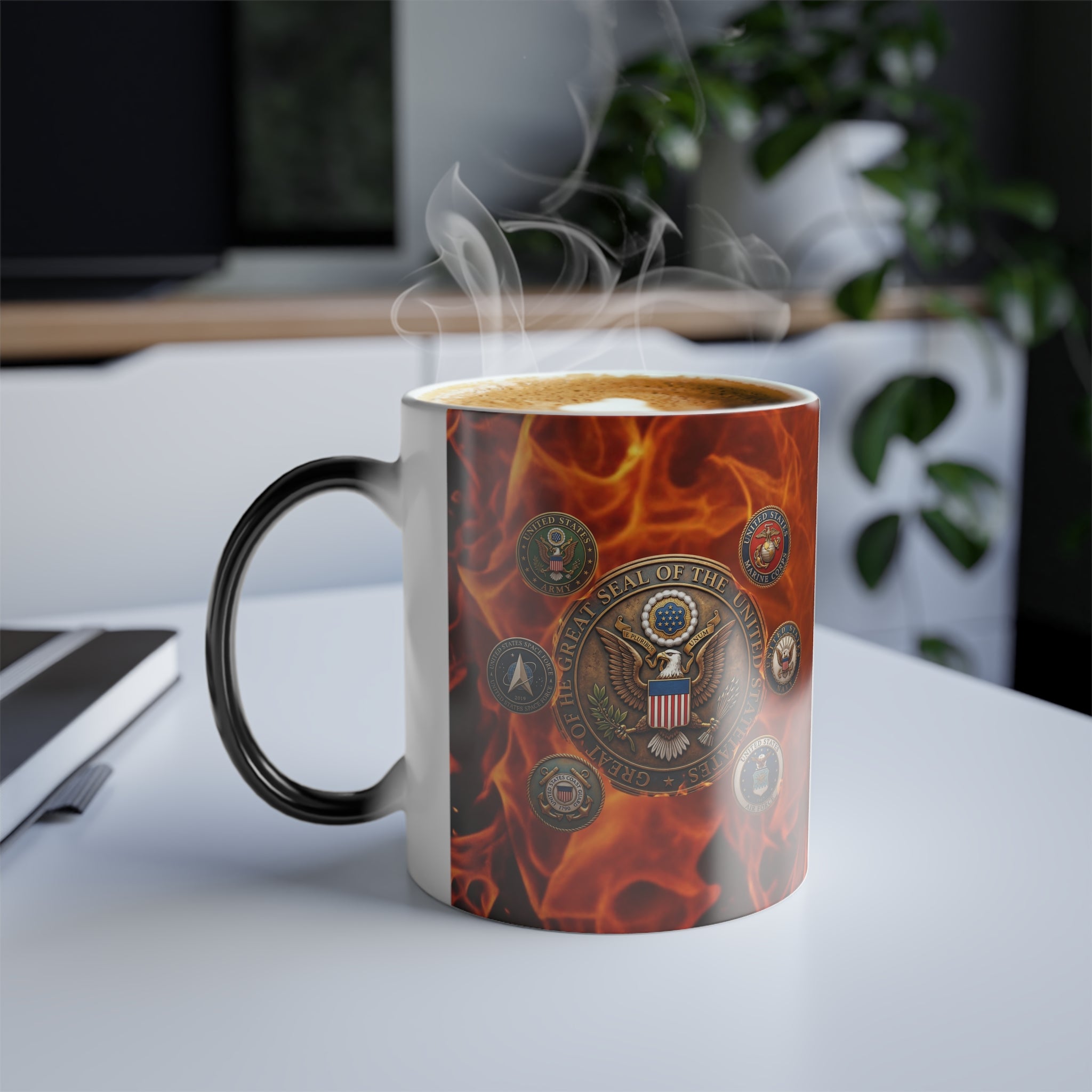 A white mug with a design featuring the seal of the United States on a flame background, sitting on a table with steam rising from it.