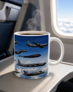 A mug with a picture of several fighter jets flying in formation against a blue sky with clouds.