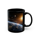A black coffee mug with a space-themed image depicting a satellite, planet, and stars against a backdrop of the Earth.