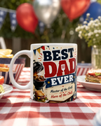 A white mug with a printed design on it, placed on a table with a red and white checkered tablecloth.