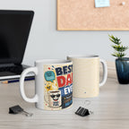 A white mug with a colorful design and text that says "BEST DAD EVER" is placed on a desk in front of a laptop and a plant.
