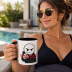 A woman wearing sunglasses and a black top is holding a mug with a cartoon character on it.