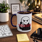 a mug with a cartoon character on it, placed on a wooden desk with a keyboard, a plant, and a note pad.